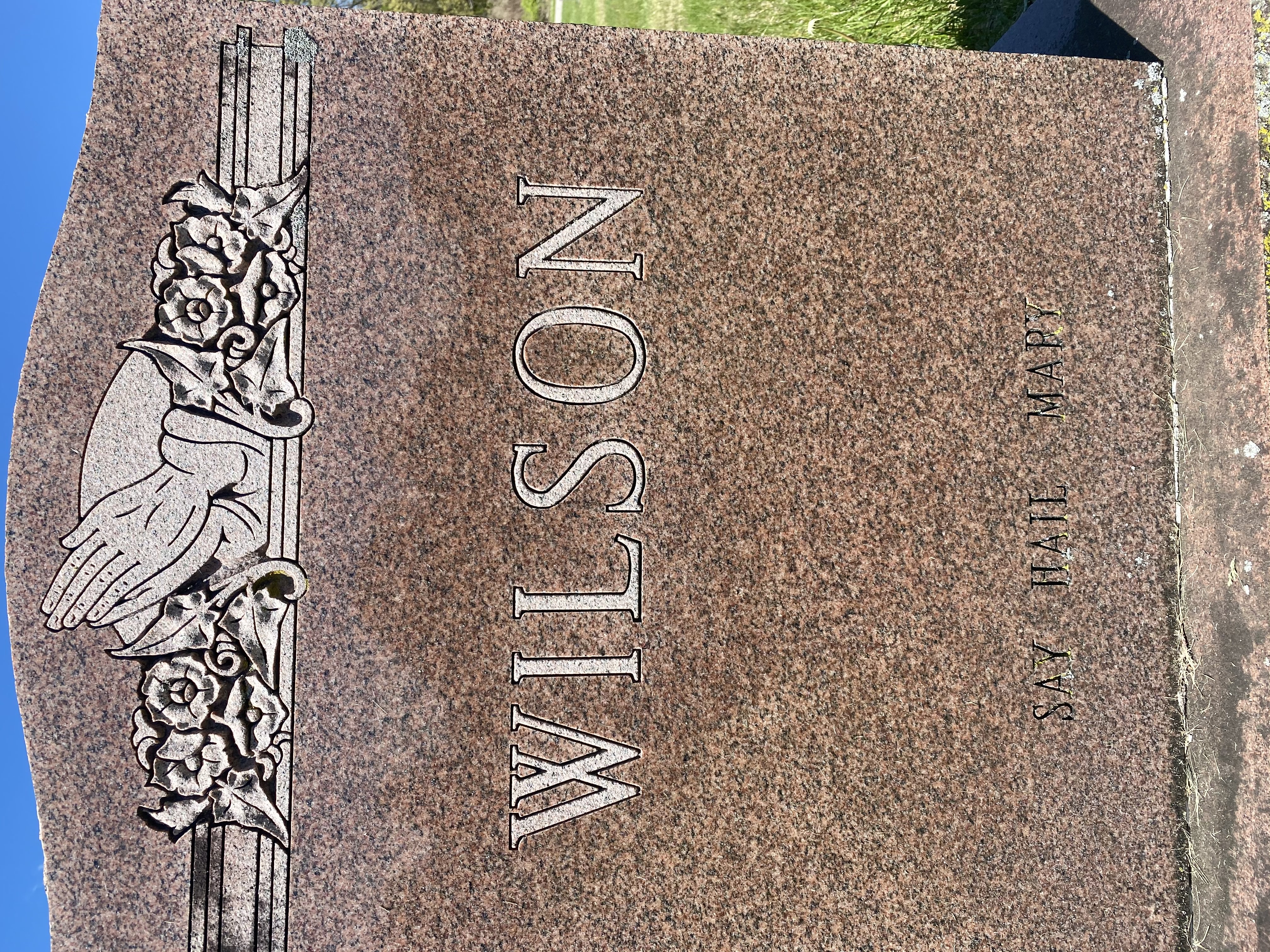 Other Side of Marie Rose's Grave, Inscribed Wilson, Say Hail Mary with hands praying surrounded by flowers